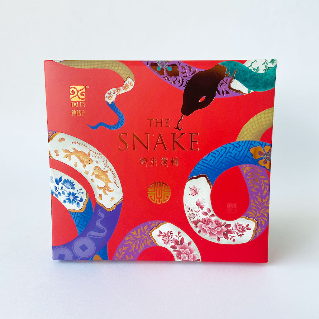 Year of the Snake fine bone china mug designed by Chris Chun, featuring a snake, carp fish, and lucky coins in intricate blue-and-white patterns with 24K gold highlights.